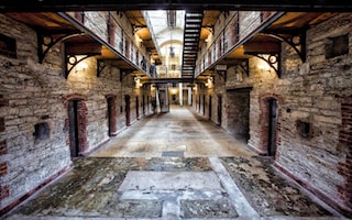 this image gives you an idea of Cork city Gaol, here it's one corridor of the prison 